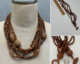 A vintage Gerda Lynggaard Monies multi strand amber-color polished horn bead statement necklace, with larger accent beads boasting distinct ribbed texture. Gerda and her husband Nikolai Monies founded their luxury jewelry business in the late '70s in Denmark, and have crafted statement jewelry for Chanel, Lacroix, and Donna Karen.