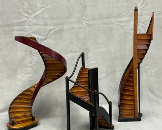 A group of three wooden 3D staircase models crafted by AM (Authentic Models) as part of their Architectural Models series.  AR012 Grand Staircase, AR020 Mission Stairs, and AR013 Lighthouse Steps.
