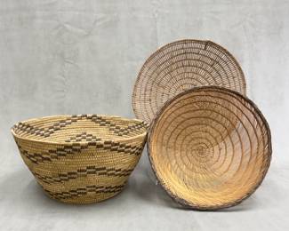 Native American woven baskets including a Papago / Tohono O'odham Nation basket and two shallow, airy woven grass baskets