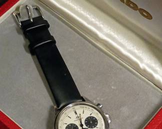 A 1950s-60s vintage Movado M95 "SUB-SEA" Chronograph wrist watch with black leather strap, in the original box. This watch has Movado Factories Swiss in-house Calibre M95 - a 17-jewel, manual-wind, column-wheel chronograph movement developed in partnership with Frédéric Piguet. Case is stainless steel, Fabrique de Boîtiers (FB) / François Borgel. Screw-down caseback stamped with Movado crown, case no. 2496, ref. 95.704.568 with "SUB-SEA" engraved on the case band.