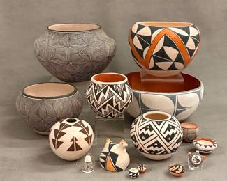 Pueblo pottery from the southwest including these vibrant hand-made and hand-decorated bowls and jars; several from Acoma Pueblo artists including Jessic Garcia, Lucy M. Lewis, Pablita Concho, and Marie and Simon Vallo; and a San Felipe Pueblo bowl from artist A. Tenorio 