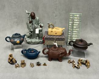 Contemporary Chinese Yixing teapots, Chinese mudmen figurines; Chinese mid-century green hardstone suanpan abacus