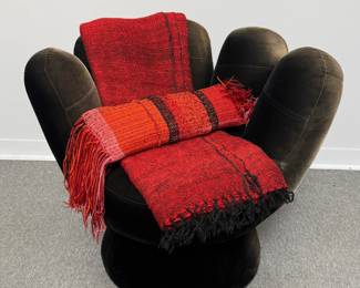 Hand-woven red-tone with black accent blanket or throw, 102" x 78"; and a red pillow with red bands and red/pink fringes (pillow is 20" x 6")