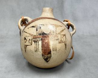 Antique Native American ceramic canteen from Zia Canyon area, decorated with a geometric avian design; circa 1890-1910