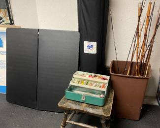 Fishing poles, tackle box, table, canopy