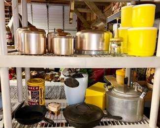Mid-Century metal canister set, cake taker, nut shopper, Mid-Century yellow plastic canister set, Griswold fry pan Lodge dutch oven, pressure cooker, etc.