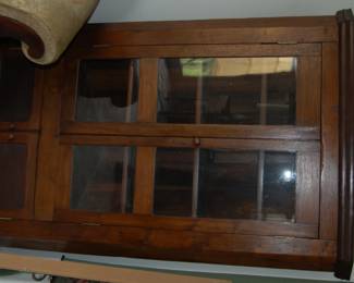 Primative transitioned & upgraded Corner Cupboard circa late 1700s / early 1800s, Pine apparent early American Colonial craft made corner cupboard early square nails, scrap pieces for joinery, worn bottom shelf Top Trim Millwork, Doors, Glass are later additions