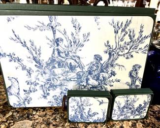 Several sets of placemats in original boxes