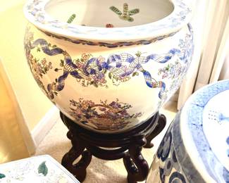 Several large fishbowl planters