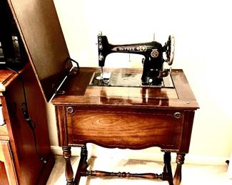 In cabinet Westinghouse Electric working sewing machine