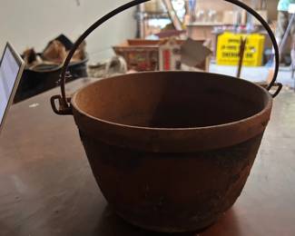 #31 Dutchen Hanging Dutch oven - Rusted - 10" D x 6"T $20.00