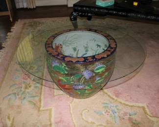 Beautiful asian pottery with heavy glass top table