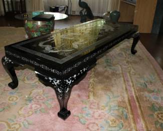 Asian black laquer table with inlayed mother of pearl dragon design