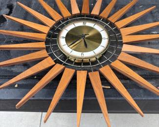 . . . battery-operated mid-century starburst clock