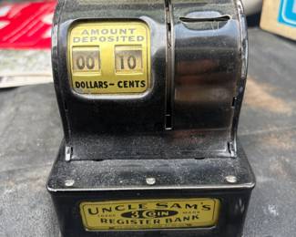 . . . Uncle Sam 3-coin cash register bank