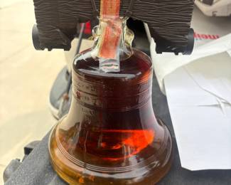 . . . sealed Liberty Bell whiskey decanter
