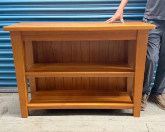 Cypress shelving with accent lighting--also a matching coffee table, not shown