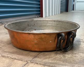 Large copper pan with iron handles