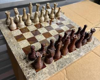 Brown coral and marble chess set. No faults. Box for chess pieces included.