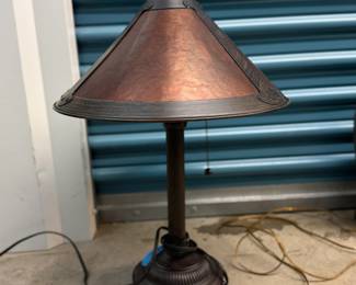 Mission style table lamp with two bulbs.