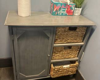 Side storage cabinet with basket drawers