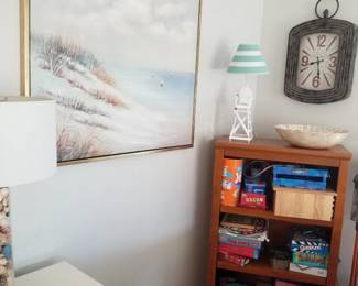 Bookcase; board games; wall clock