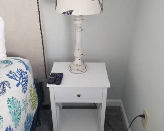 Nightstand; table lamp
