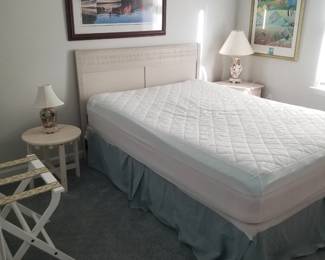 Queen bed; nightstands; table lamps; luggage rack