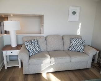Nearly new couch; end table; table lamp