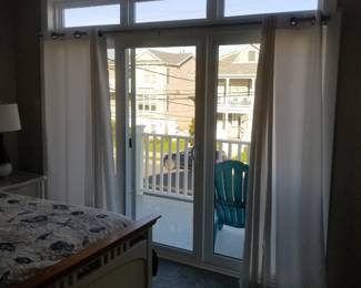 Updated sliding glass doors; curtain rods & panels