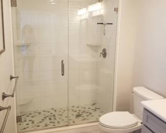 Glass shower enclosure