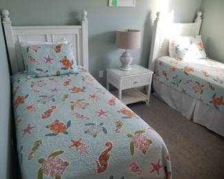 Twin bedroom suite; twin beds; nightstands; dresser with mirror