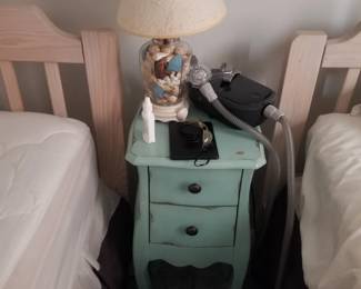 Nightstand; table lamp