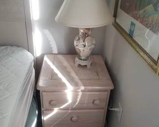Nightstand; table lamp
