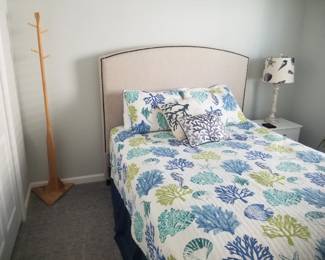 Oar coat tree; queen bed; nightstand; table lamp