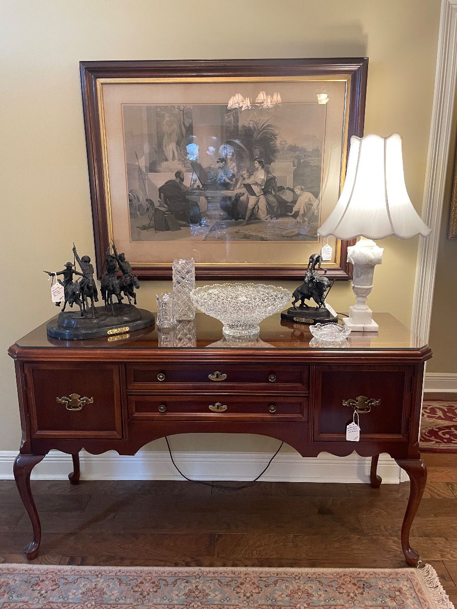 View of entry with Bassett cherry sideboard 