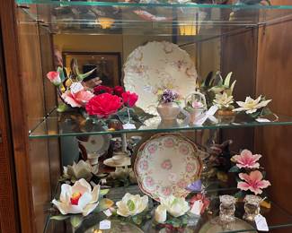 Collection of china flowers by Andrea, Lefton, Cape de Monte, and Ron Von Ruycevelt with Nippon and Limoges plates
