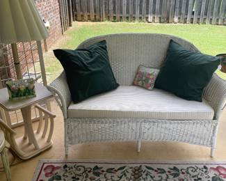 Vintage wicker live seat with retro rattan lamp table 