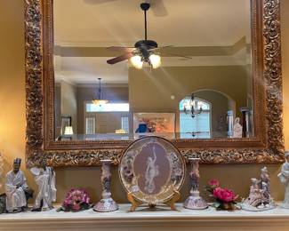 View of mantle with wonderful gold leaf beveled mirror 
