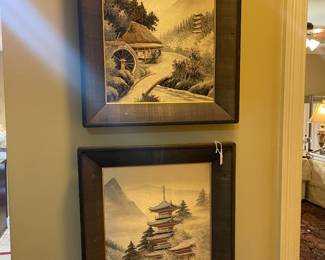 Pair of framed oriental silk tapestries 