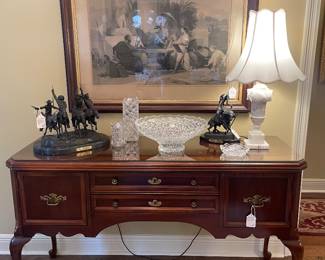 View of entry with Bassett cherry sideboard 