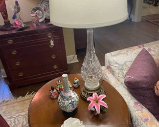 Mahogany drop leaf end table with mid century cut crystal lamp