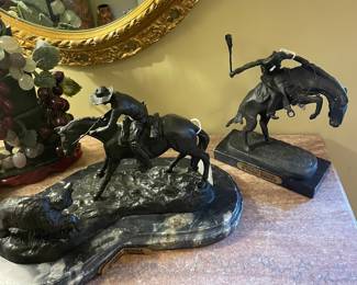 Remington bronzes “ Double Trouble “ ( left) and “ Bronco Buster” ( right)