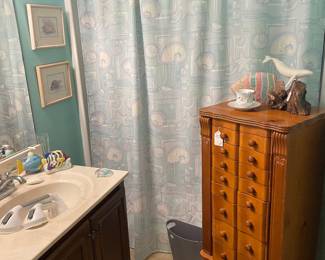 View of front hall bath with jewelry chest