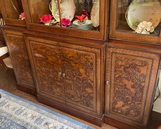 Detail of carved oriental cabinet 
