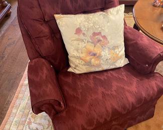 One of a pair plum swivel armchair 