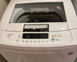 #63 LG Washer WT1101CW $300.00
