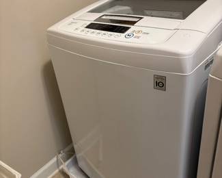 #63 LG Washer WT1101CW $300.00