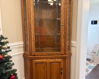 #27 Oak Corner Cabinet Lighted 40x81 $125.00