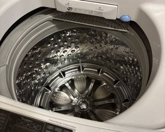 #63 LG Washer WT1101CW $300.00